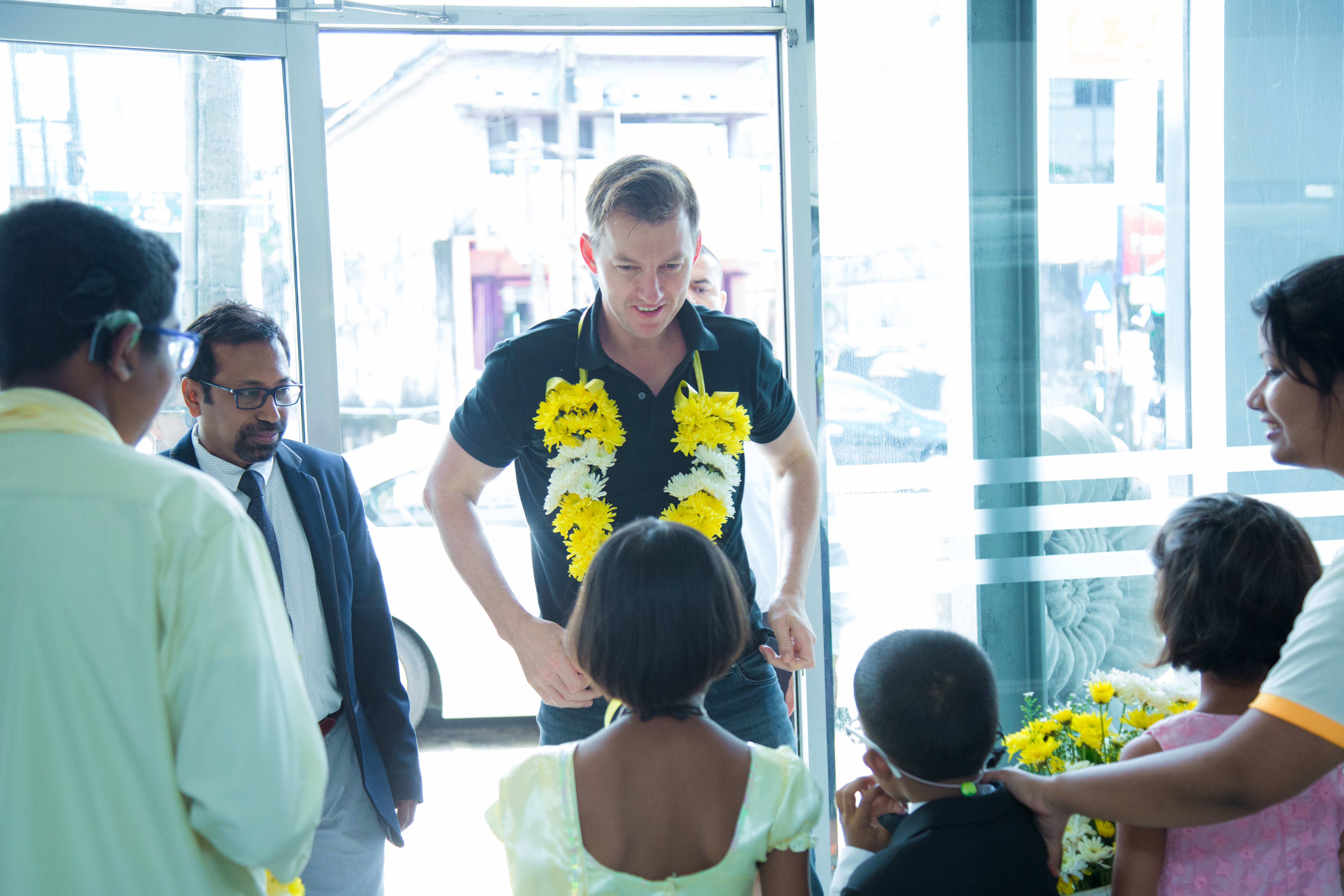 Celebrity visit to WISH Foundation — children and guests at the event