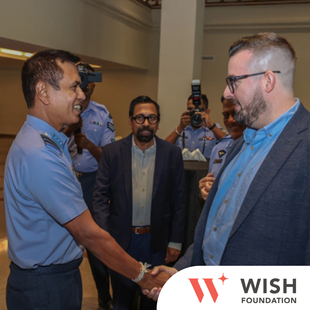 WISH Foundation representatives at the SLAF hearing aid donation event