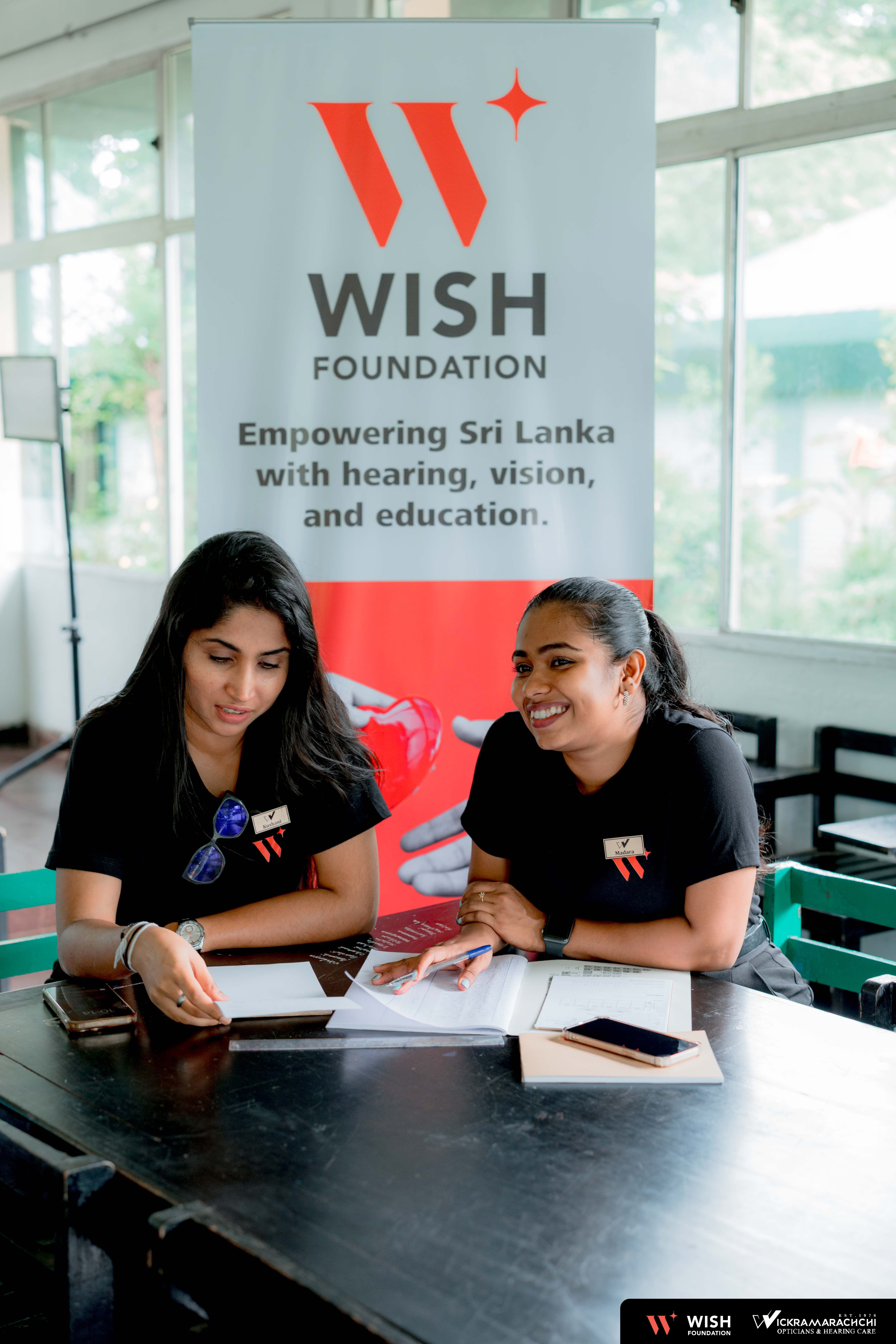 Child receiving eye screening at WISH camp