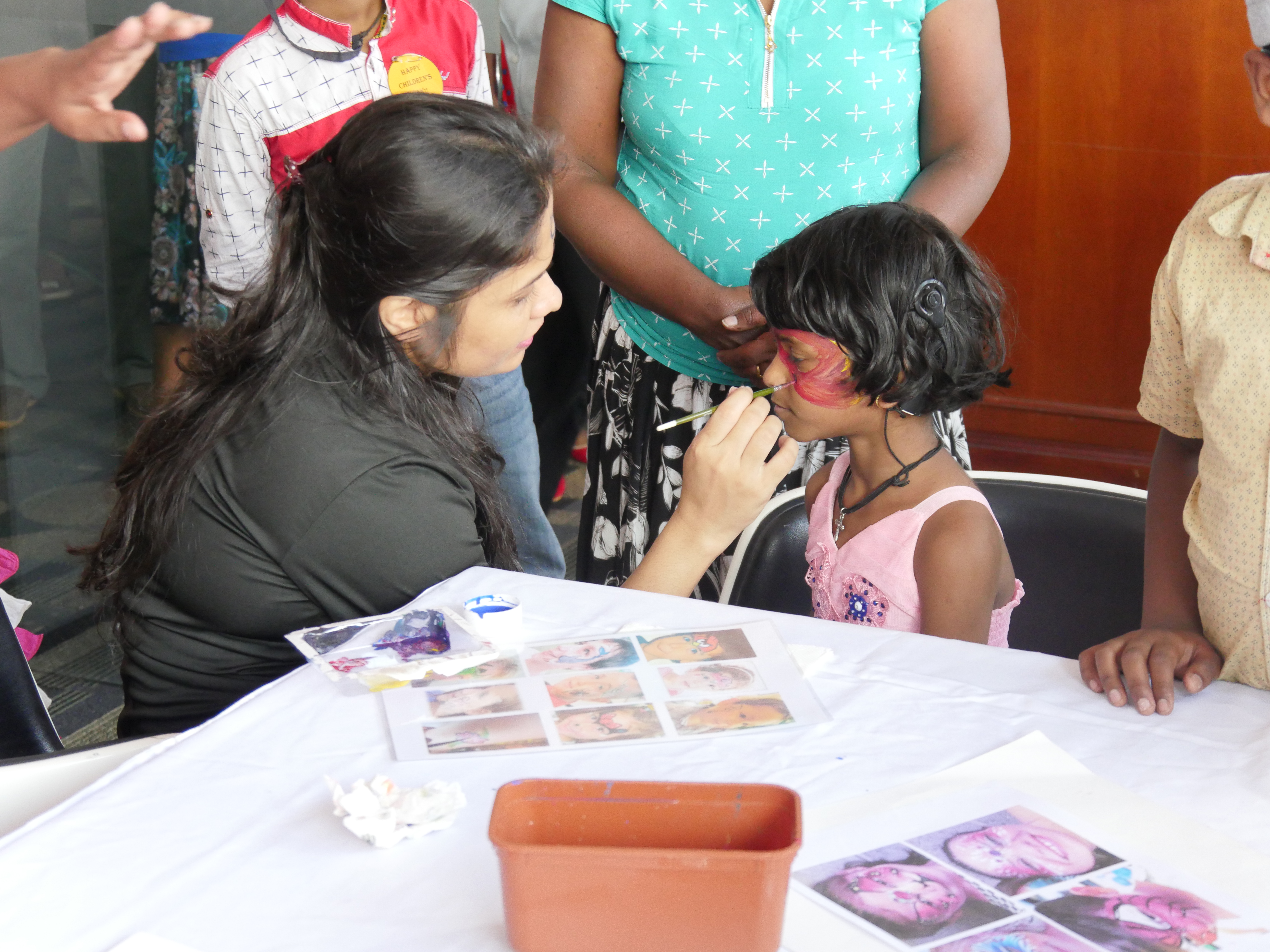 Children and team at WISH Foundation event